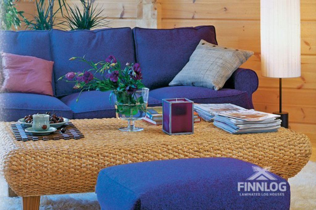 Fortuna Blockhaus - Wohnbereich mit Couch